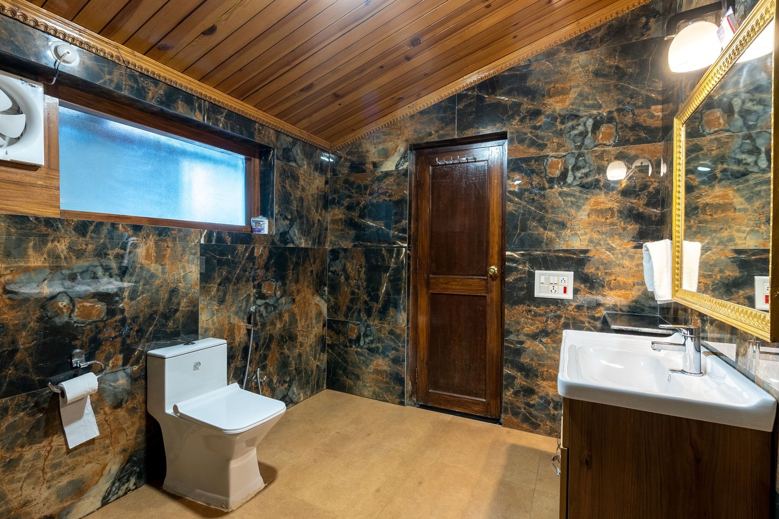 Corbett Suite colonial era seating and decor at The Hive Cottage Nainital